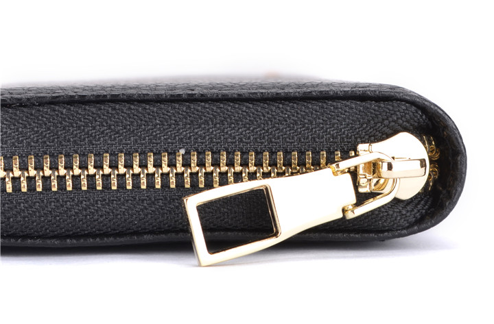 啄木鳥頭層牛皮商務(wù)智能充電手包、男士手包